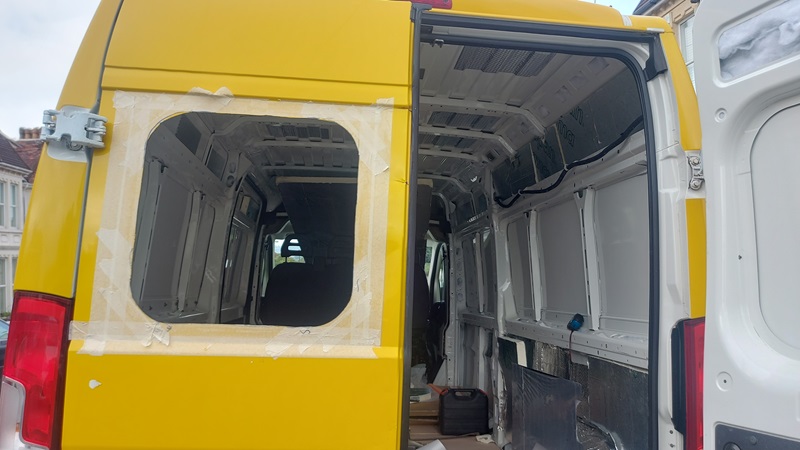 Peugeot Boxer back van door open, stripped out, ready for van conversion
