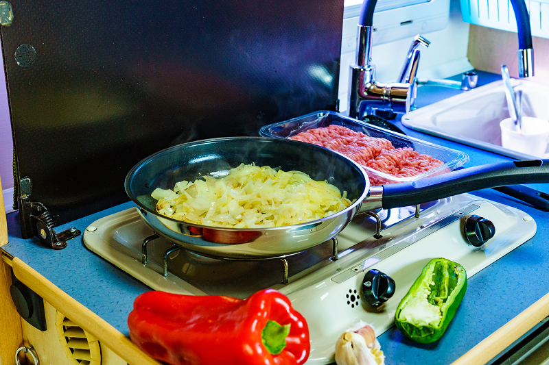 caravan kitchen area cooking dinner meal campervan holiday adventure