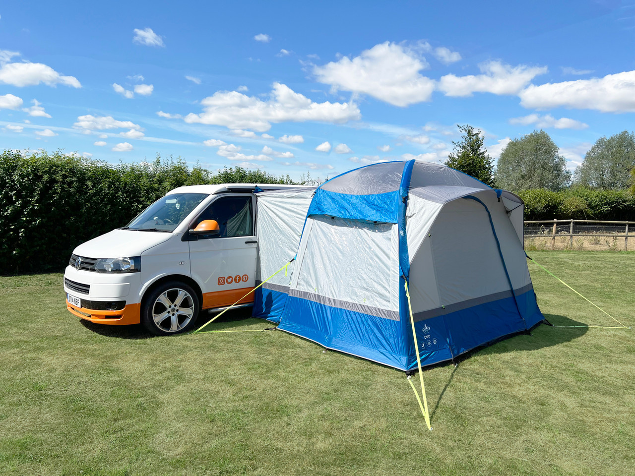 OLPRO van awning connected to camper van side door